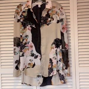 Woman’s size medium black and cream blouse